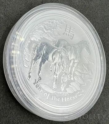Монета Австралия 1 доллар 2014 \"Год лошади позолота\" в футляре, с  сертификатом стоимостью 13717 руб.