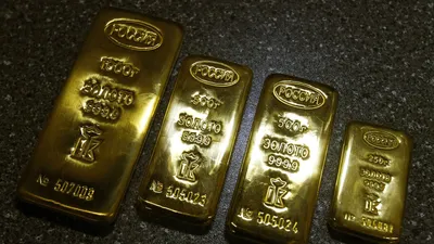 Эксперт порекомендовала не вынимать золотые слитки из банковской упаковки -  РИА Новости, 04.04.2022