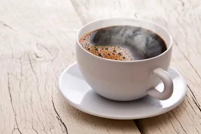 Чашка кофе в женской руке, вид на…» — создано в Шедевруме
