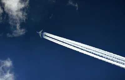 Летящий пассажирский самолет на фоне синего неба Stock Photo | Adobe Stock