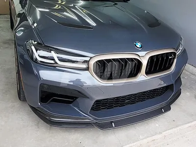 New BMW M5 F90 LCI Competition in a red color on the forest road. Kyiv,  Ukraine - June 2021. Stock Photo | Adobe Stock