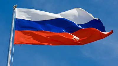 Флаг России развевается на фоне голубого неба Stock-Foto | Adobe Stock