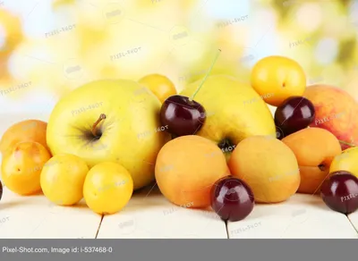 фрукты разные яркие лежат на столе и есть место для надписи Stock Photo |  Adobe Stock
