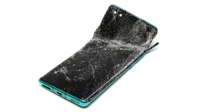 Макросьемка разбитого стекла - обои на телефон