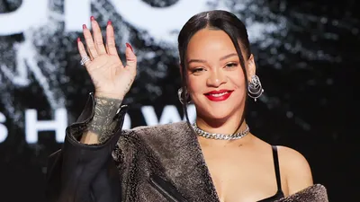 Rihanna's Baby Reveal Pics Are Cute, Sure, But Can We Talk About Her Tower  of Curls? See Photos | Allure