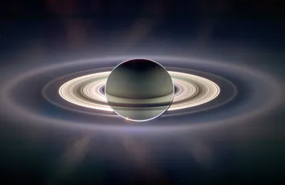 Сатурн со спутниками из космоса, показывающими всю их красоту. Чрезвычайно  подробное изображение, включая элементы, предоставленные НАСА. Другие  направления и планеты . стоковое фото ©Shad.off 84414822