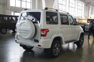 Selling cars UAZ Patriot in the showroom. New products automaker UAZ.  Russia Stock Photo | Adobe Stock