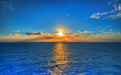 Восход солнца над морем стоковое фото ©Kokhanchikov 5164117
