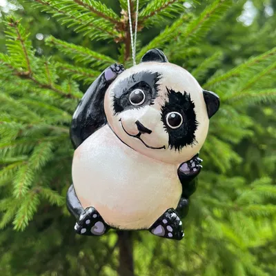 Ультра милая вязаная панда в …» — создано в Шедевруме