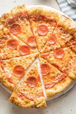 Homemade Pepperoni Pizza Recipe - Sip Bite Go