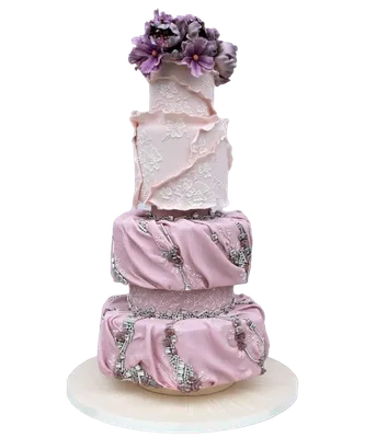 Элегантный белый свадебный торт, украшенный цветами из мастики на белом  деревянном столе. | Премиум Фото
