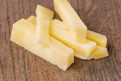 Сыр твёрдый Palermo 40% - купить с доставкой в Москве в Перекрёстке