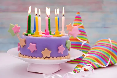 Праздничный торт со свечами и пирожные Stock Photo | Adobe Stock